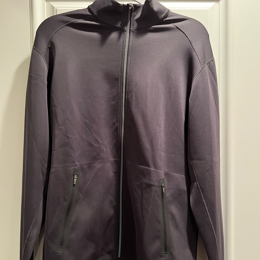 Mens new balance zip up jacket.